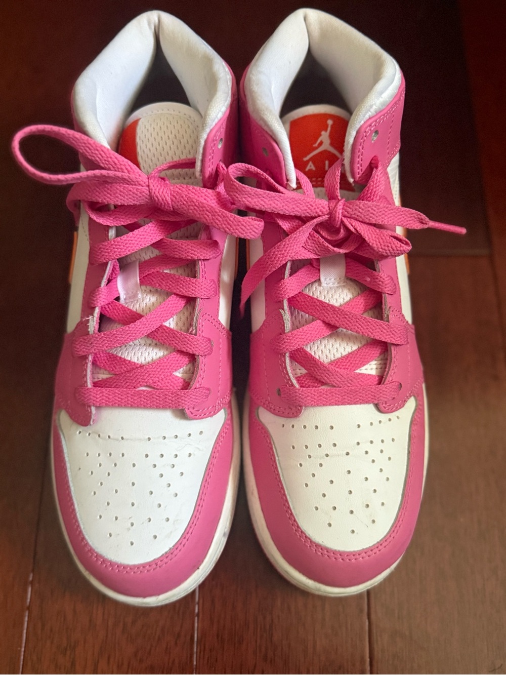 Nike Kids Pink and White High-Top Sneakers with Orange Accents